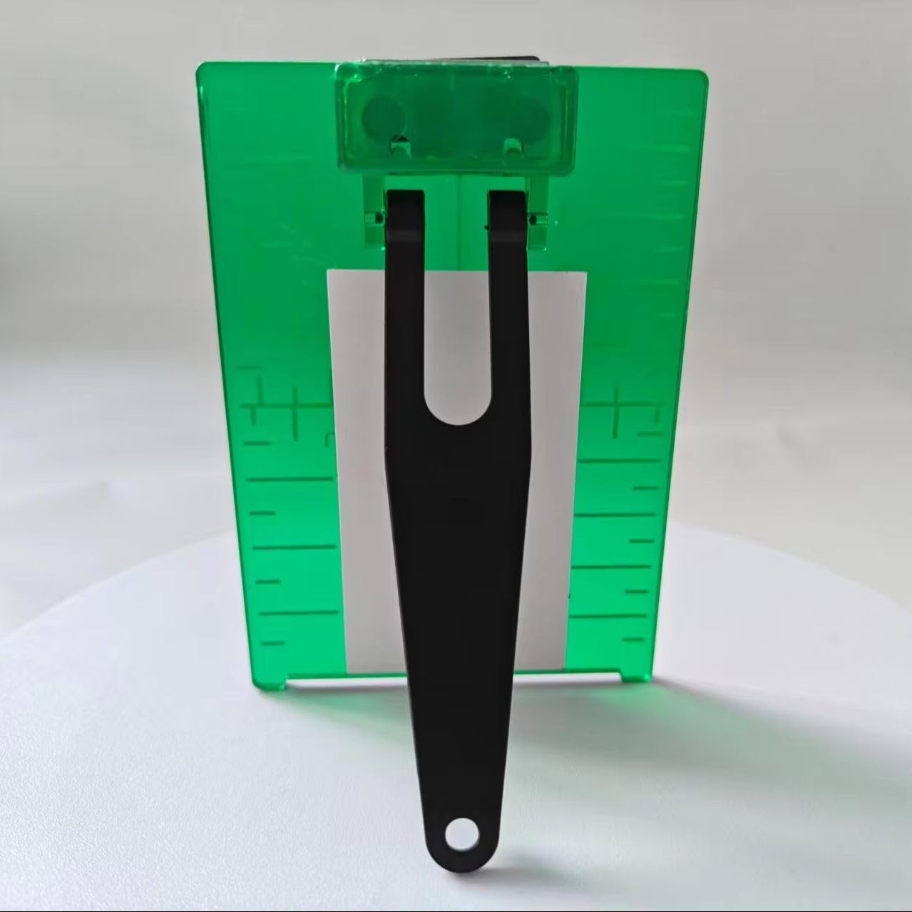 Ceiling Leveling Strip magnetic laser target tool in green and black, ideal for level installations.