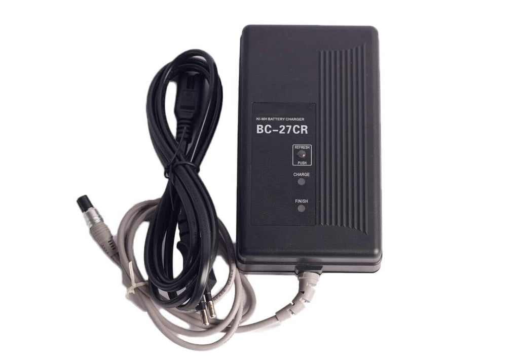 BC 27CR Charger for BT 52Q and BT 52QA Battery with charging cable, designed for total stations and surveying instruments.