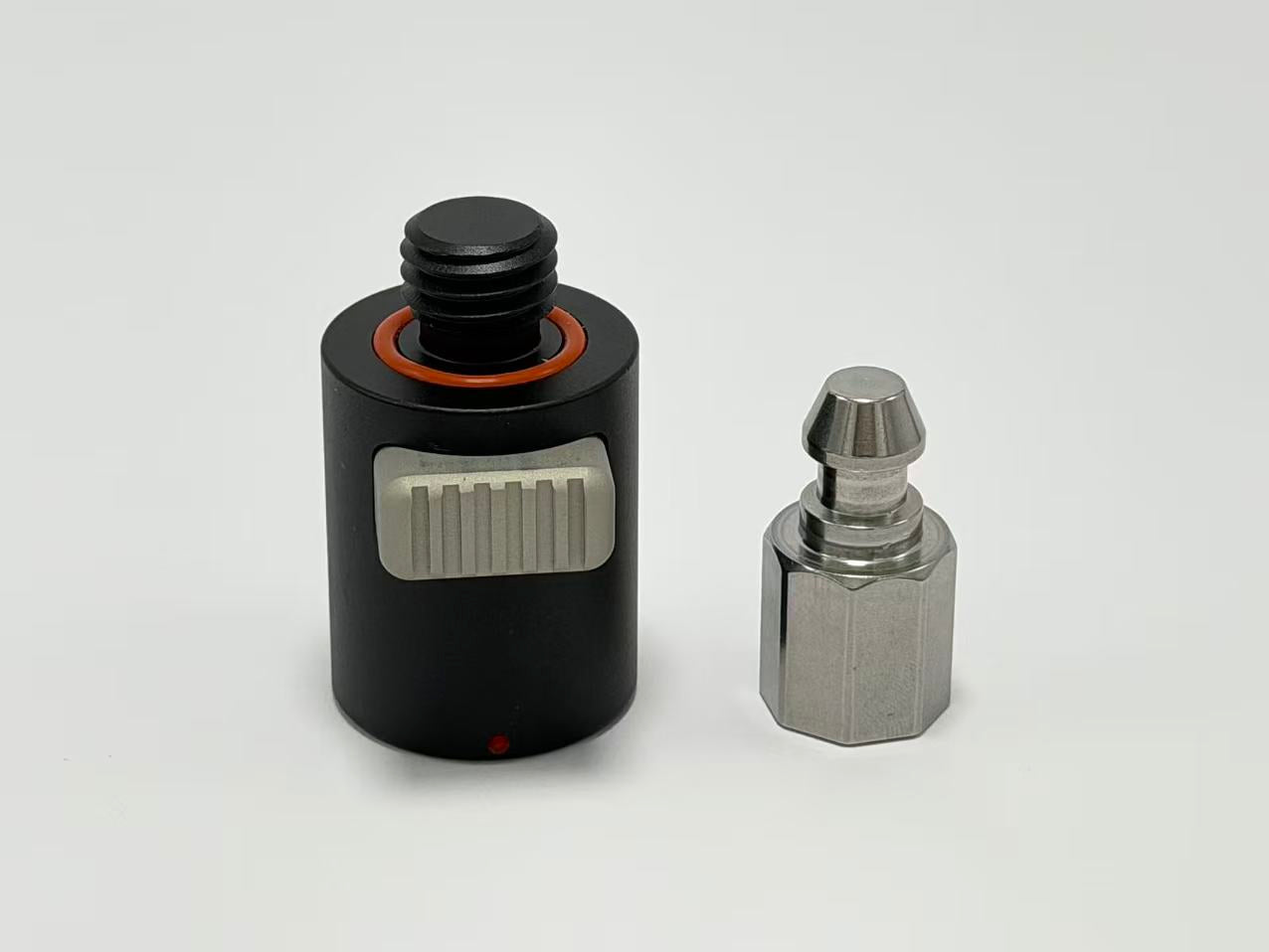 Quick Release Adapters for GPS Poles, featuring a black adapter and silver connector for GPS equipment.